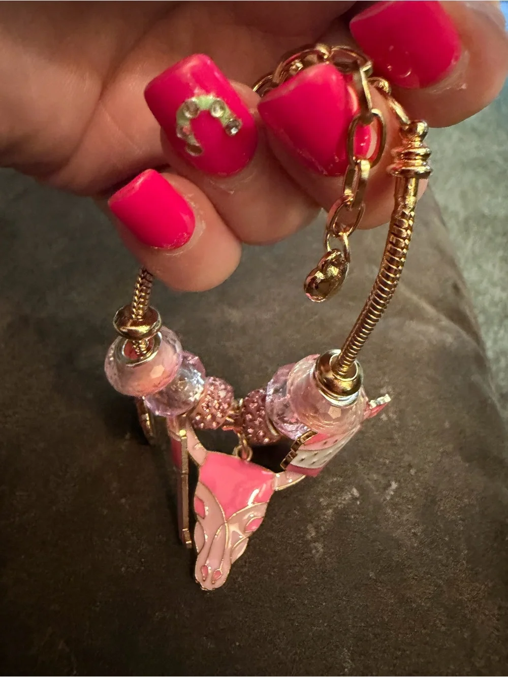 Gold-Tone Pink Charm Bracelet with Crystal Beads